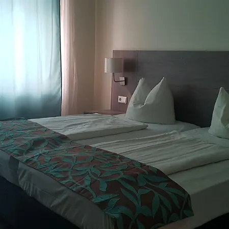 Cara Hotel Kolonia