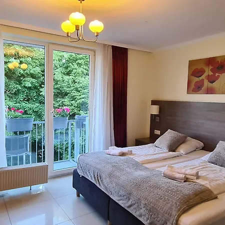 Cara Hotel Kolonia